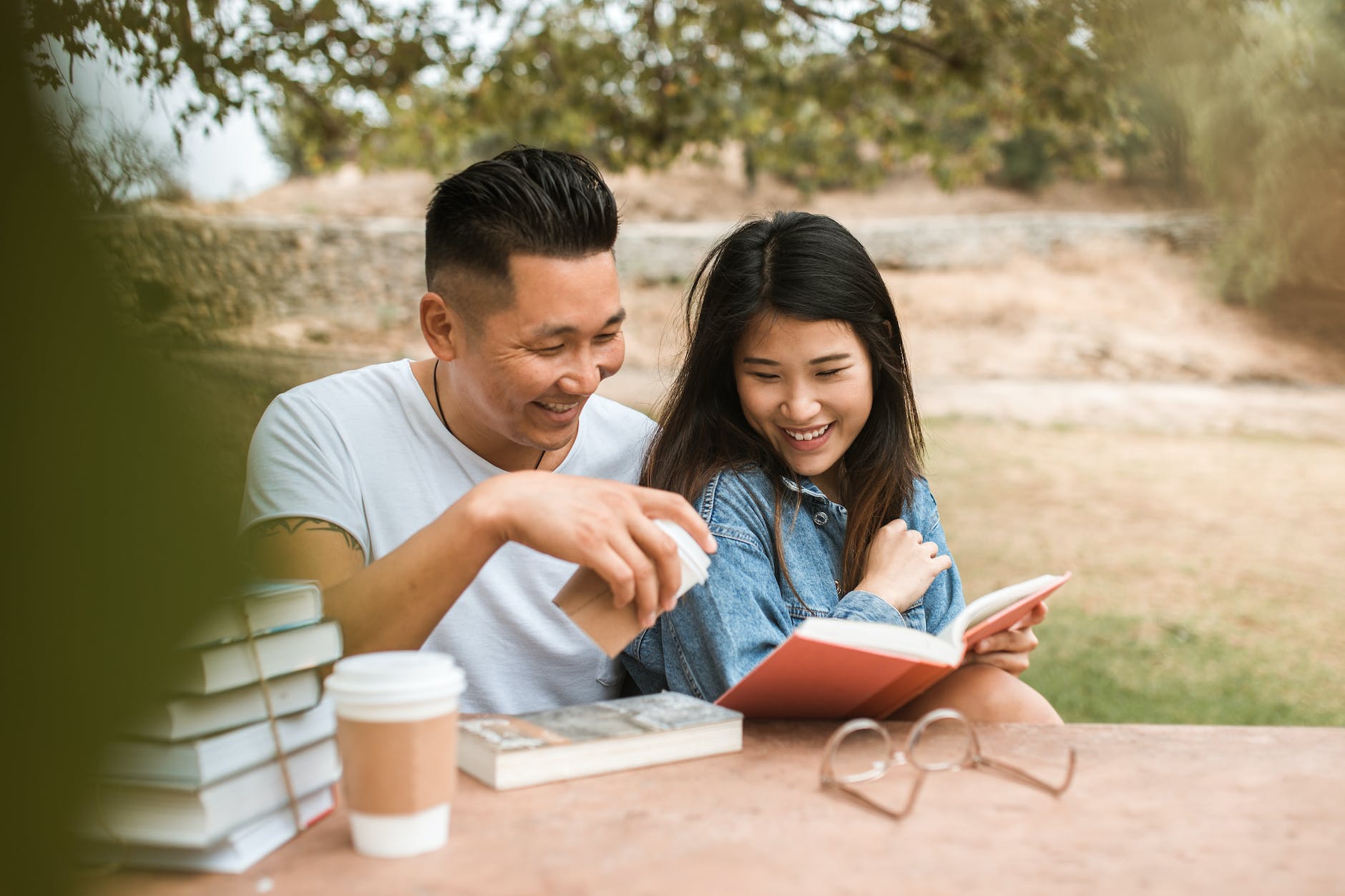 a couple reading book together