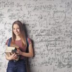 woman holding books